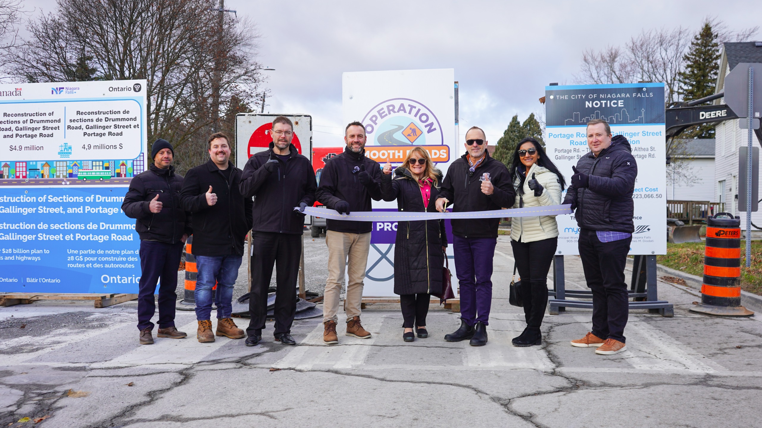 Group photo, including Mayor, CAO, City Council, and key staff members at the "kick-off" of Operation Smooth Roads at Portage Road