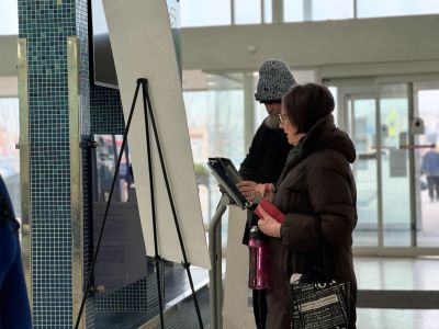 Image of two residents filling out a survey on the iPads